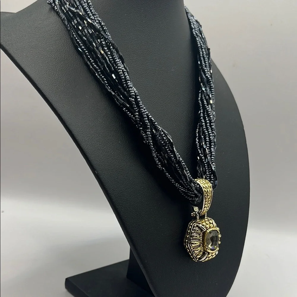Elegant Black Beaded Necklace with Gold and Silver tone Pendant with Quartz